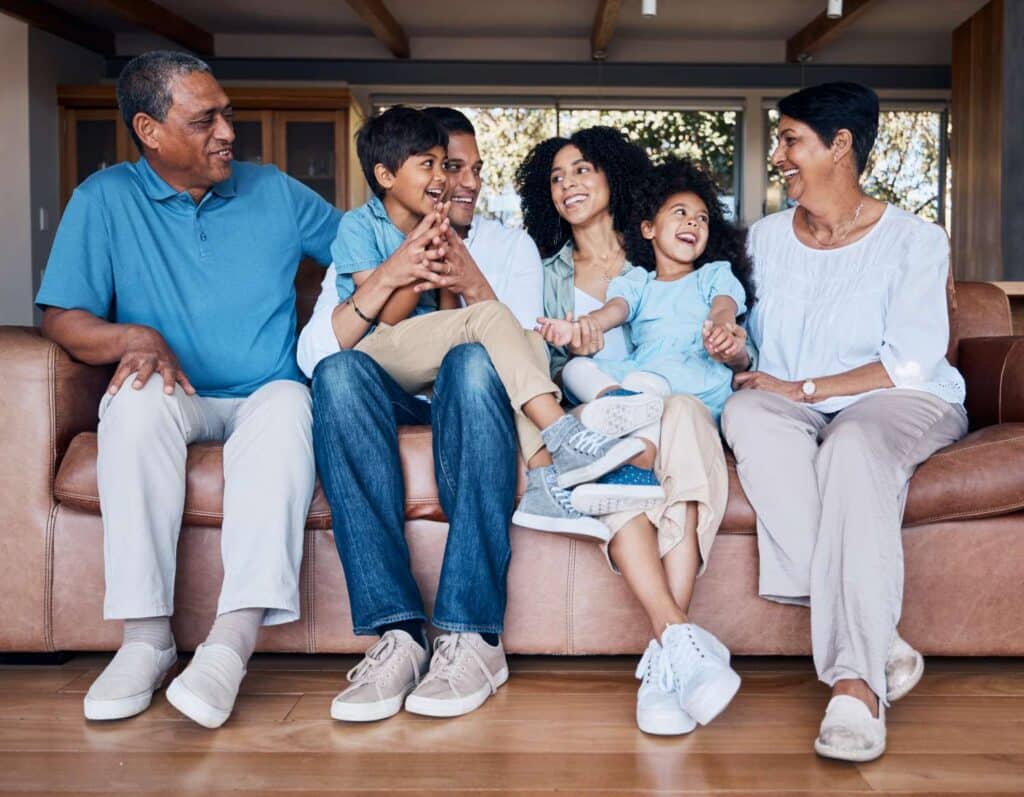 smile funny and relax with big family on sofa for 2023 08 26 07 34 28 utc